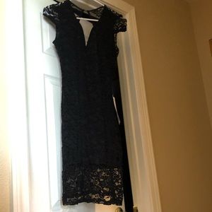 Black, knee length, lace cocktail dress